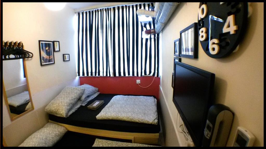 Micro Hotel Hong Kong Quarto foto