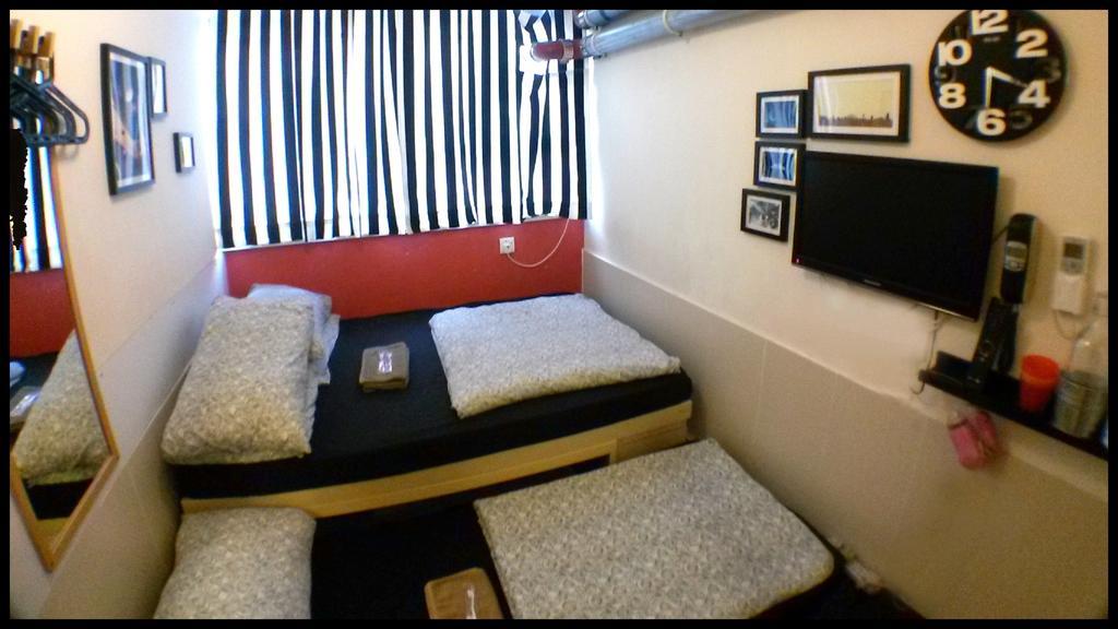 Micro Hotel Hong Kong Quarto foto